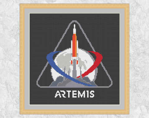 Artemis Mission Patch (NASA moon landings mission) cross stitch pattern. Shown in frame.