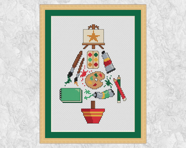 Artists' Christmas Tree cross stitch pattern. Shown with frame.