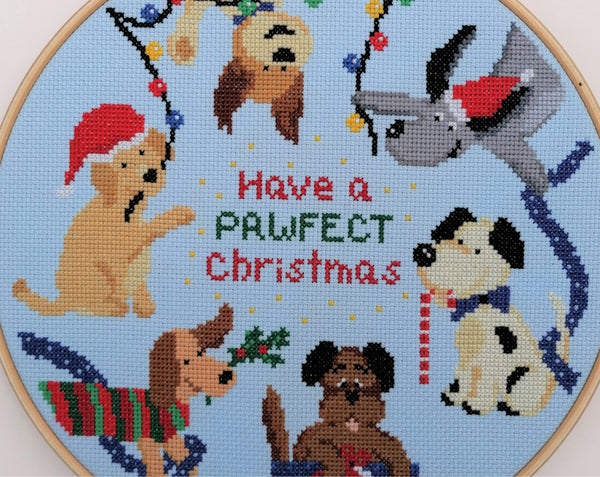 Christmas Dogs and Christmas Cats cross stitch patterns. Close up of Christmas Dogs pattern.