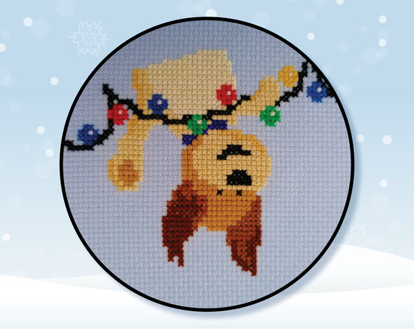 Christmas Dogs cross stitch pattern. Close up of one dog.