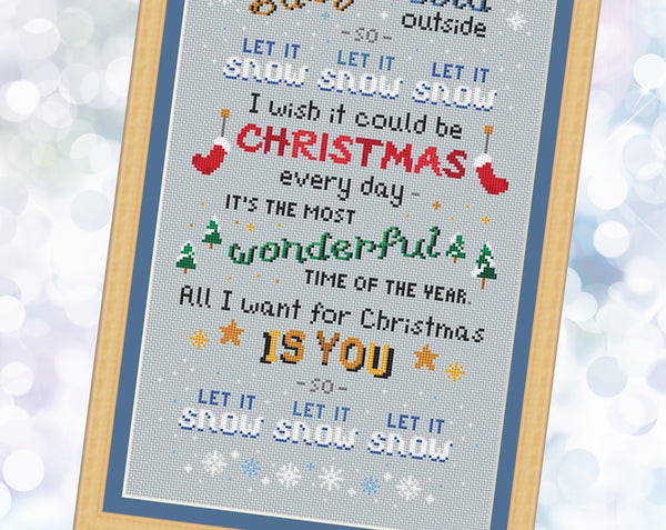 Christmas Songs cross stitch pattern. A large pattern of a poem made up of popular Christmas song titles. Close up of lower half of pattern.