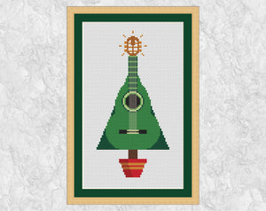 Guitar Christmas Tree cross stitch pattern. Shown in frame.