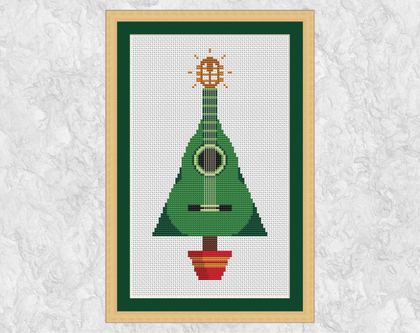 Guitar Christmas Tree cross stitch pattern. Shown in frame.