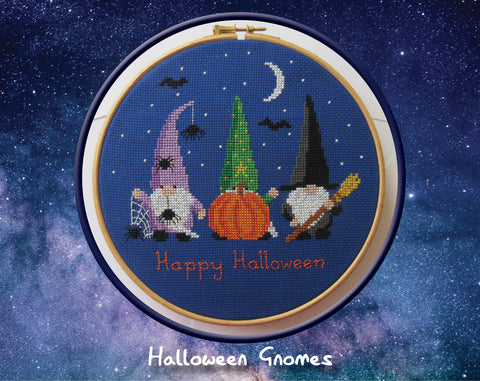 Halloween Gnomes cross stitch pattern. Three fun gnomes displayed in a hoop.