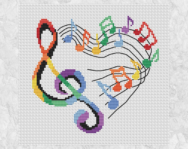 Heart of Music cross stitch pattern. Treble clef and music notes making the shape of a heart. Shown without frame.
