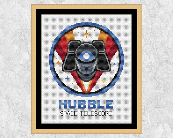 Hubble Space Telescope cross stitch pattern - shown on white fabric with frame