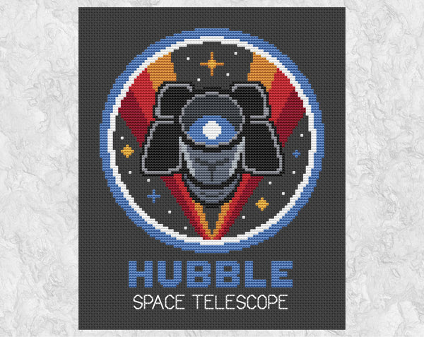 Hubble Space Telescope cross stitch pattern - shown on dark fabric without frame