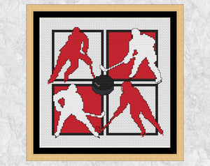 Ice Hockey Players cross stitch pattern. The silhouettes of four ice hockey players in red and white, with a puck in the centre. Shown with frame.