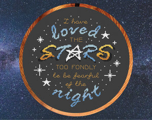Inspirational cross stitch pattern quote - "I have loved the stars too fondly to be fearful of the night". Shown in ten inch hoop.