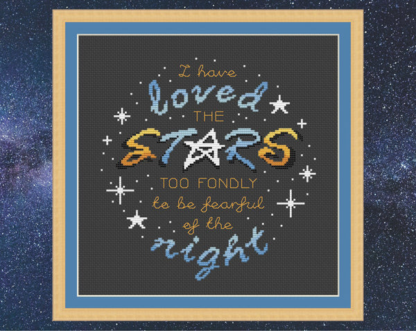 Inspirational cross stitch pattern quote - "I have loved the stars too fondly to be fearful of the night". Shown in frame.