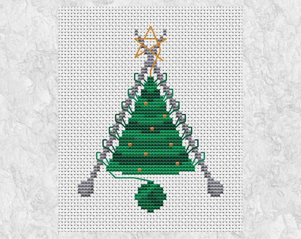 Knitted Christmas Tree cross stitch pattern. A knitted Christmas Tree shape still on the knitting needles, with a ball of yarn forming the pot. Shown without frame.