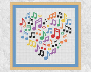 Larger Music Notes Heart cross stitch pattern. Shown with frame.