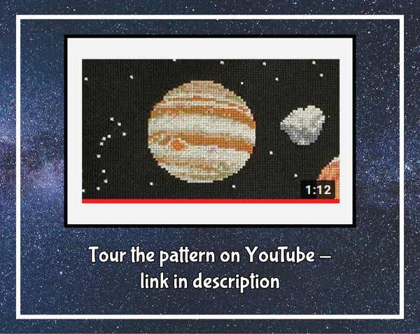 Wonders of the Solar System cross stitch pattern - image of a frame from the YouTube video of the pattern, with the words "Tour the pattern on YouTube - link in description"