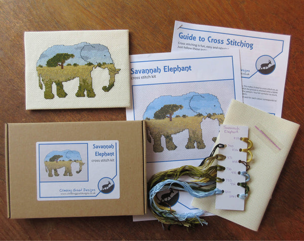 Elephant cross stitch kit - everything you need to stitch a silhouette of an elephant filled with a scene of the African savannah. Kit contents: Labelled box, complete cross stitch instructions, cross stitch chart, sorted threads card, fabric and needle.