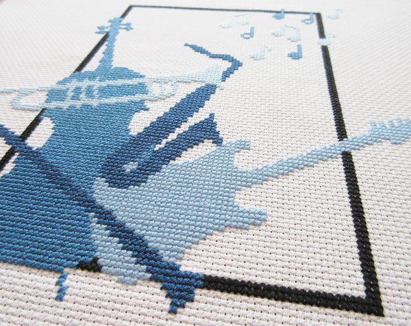 Musical Cluster cross stitch pattern - close up angled view of stitching