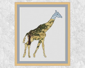 Grasslands Giraffe cross stitch pattern - silhouette of a giraffe filled with savannah and a large tree. Shown with frame.