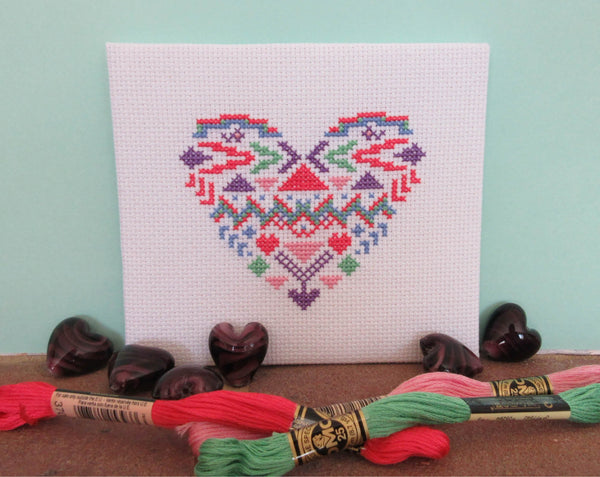 Geometric Heart cross stitch pattern in pastel colours - with bead hearts and thread skeins