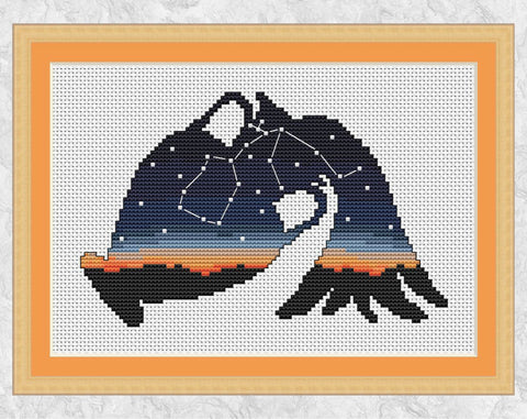 Aquarius cross stitch pattern - Zodiac at Home Collection - astronomy and space design. Shown with frame.
