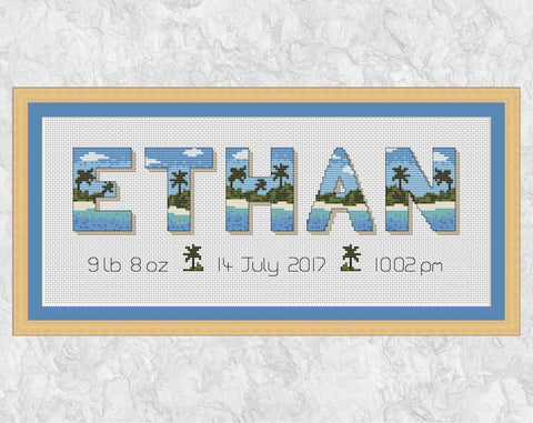 Desert Island Birth Announcement - customised cross stitch pattern. Large capital letters spelling a name, with each letter filled with a desert island scene. Beneath the name are the birth details, separated by little palm trees. Example pattern with name 'Ethan', shown with frame.