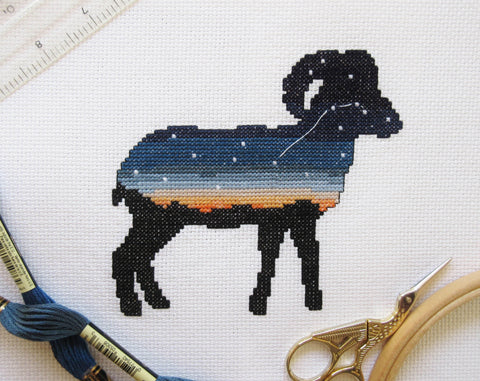 Aries cross stitch pattern - Zodiac at Home Collection. Stitched piece with props.