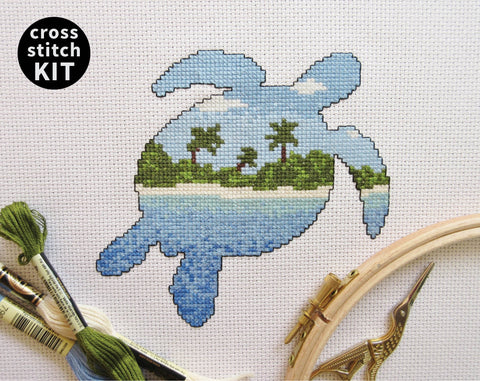 Desert Island Turtle cross stitch kit - silhouette design of a turtle filled with a scene of a desert island beach.