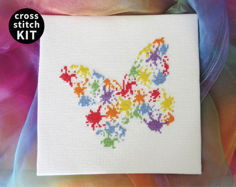Splattered Paint Butterfly cross stitch kit - brightly coloured butterfly silhouette made of watercolour effect 'blobs'.