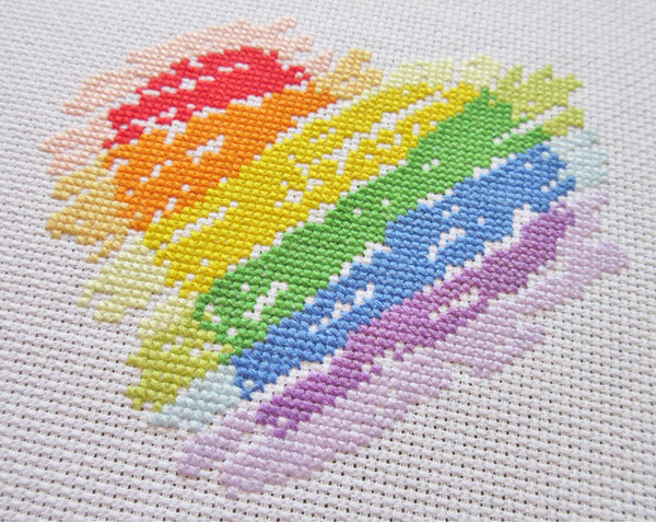 Rainbow Heart cross stitch kit - angled view of stitched piece