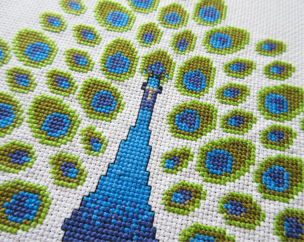 Peacock cross stitch pattern - angled close up of stitching