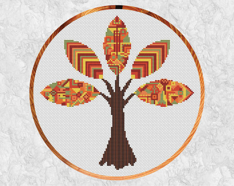 Patterned Autumn Tree cross stitch pattern - fall forest design. Shown with hoop.