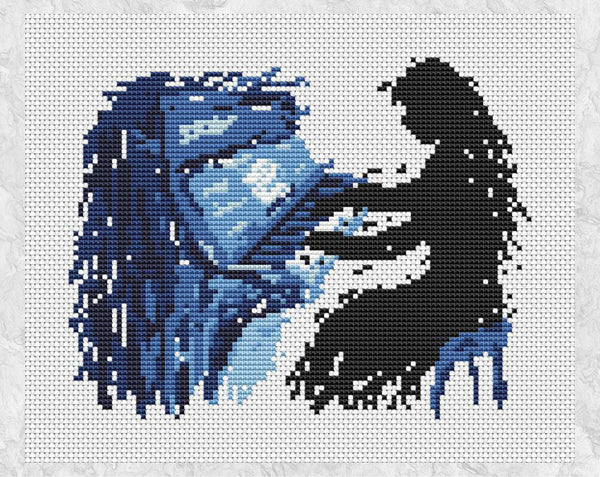 Splattered paint female pianist cross stitch pattern. Shown without frame.