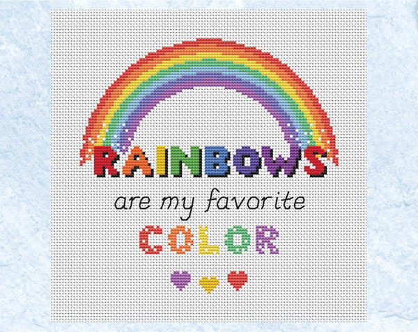 Cross stitch pattern of the quote 'Rainbows are my Favourite Colour' with a rainbow and hearts. US spelling version displayed without frame.