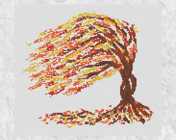 Colourful modern cross stitch pattern of a tree in the autumn or fall gales - without frame