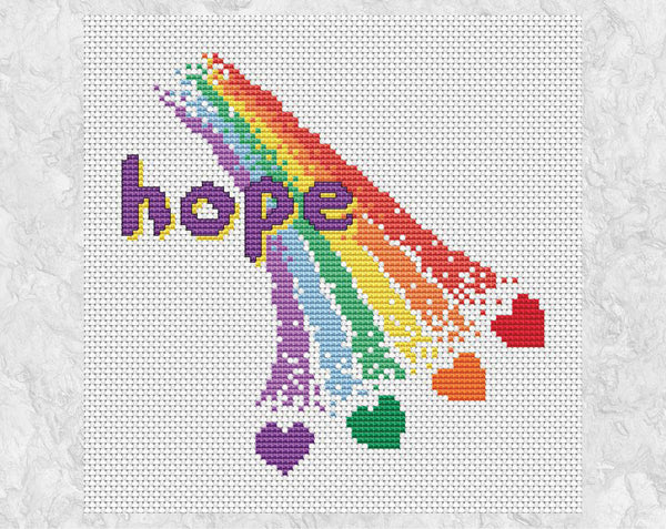 Rainbow of Hope cross stitch pattern - section of rainbow with hearts coming out of the end. This version has the word 'hope' on it and is shown without a frame.