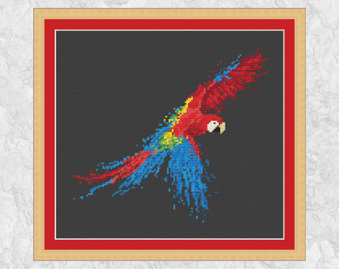 Splattered Paint Parrot cross stitch pattern - on black with frame