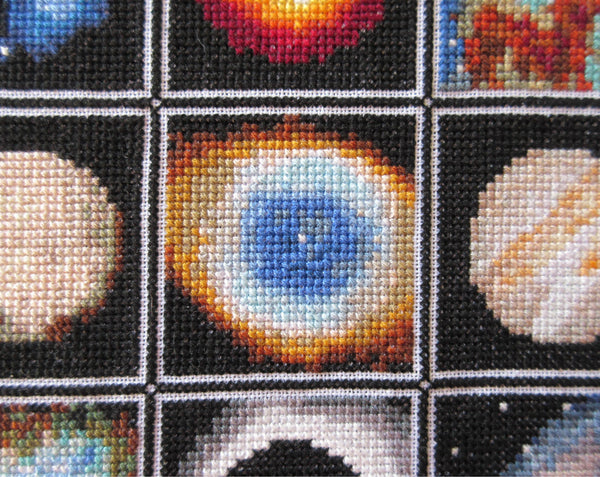 Wonders of Space cross stitch stitchalong - close up of stitching, focussing on the central image of the Ring Nebula.