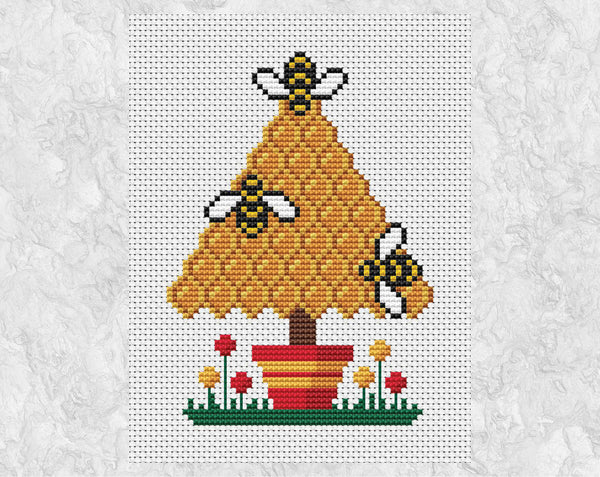 Bee Christmas Tree cross stitch pattern - bees and honeycomb forming a tree shape - shown without frame