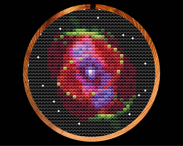 Cat's Eye Nebula cross stitch pattern in hoop