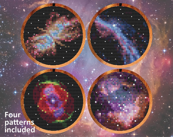 Set of four astronomy cross stitch patterns, showing the Butterfly Nebula, part of the Veil Nebula, the Cat's Eye Nebula, and part of the Small Magellanic Cloud. Shown in hoops against galaxy background.