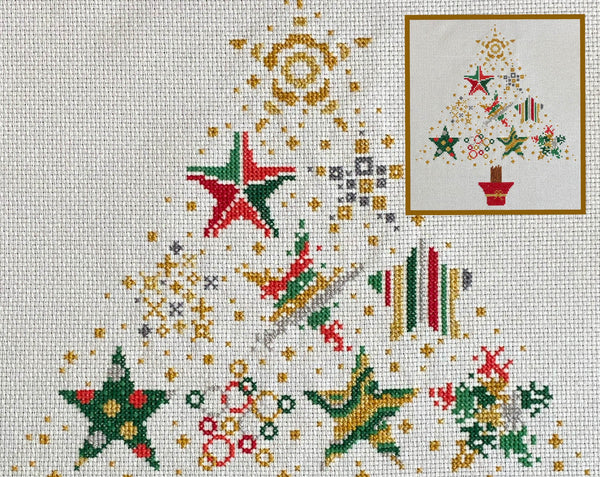 Christmas Stars cross stitch pattern - Christmas tree made up of ten differently styled stars, in red, green, gold and silver. Close up of stitched piece.