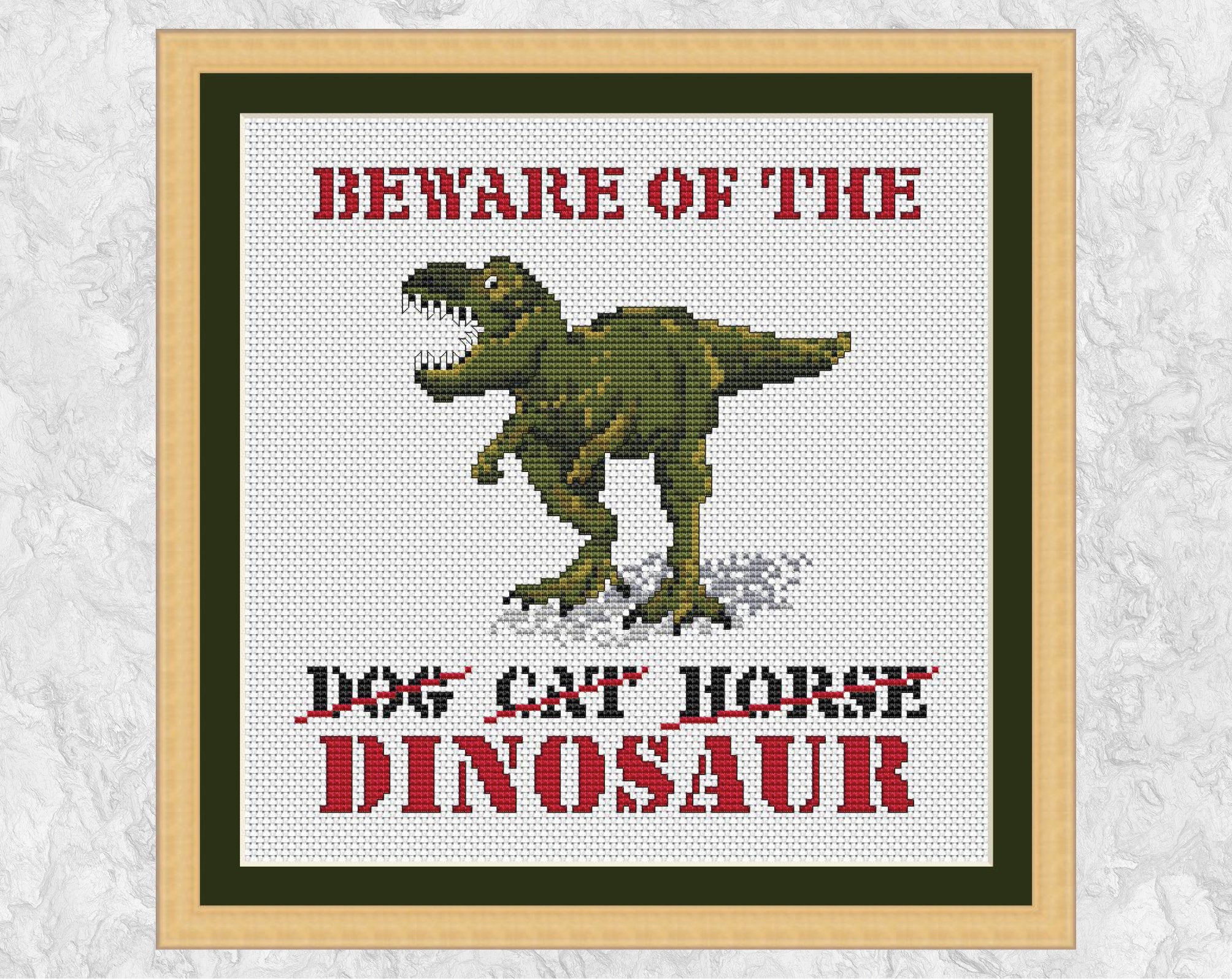 'Beware of the Dinosaur' cross stitch pattern with frame