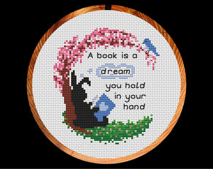 Book quote cross stitch pattern - 'A book is a dream you hold in your hand' - Together Bunnies Collection - shown in hoop