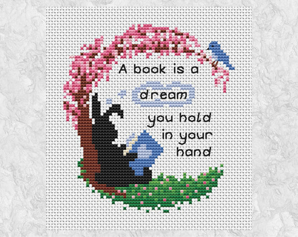 Book quote cross stitch pattern - 'A book is a dream you hold in your hand' - Together Bunnies Collection - shown without frame
